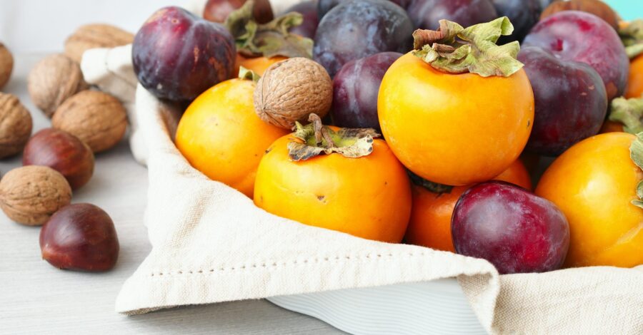 PERSIMMON WITH PLUMS AND WALNUTS