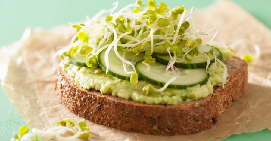 AVOCADO SPREAD WITH SPROUTS ON TOAST