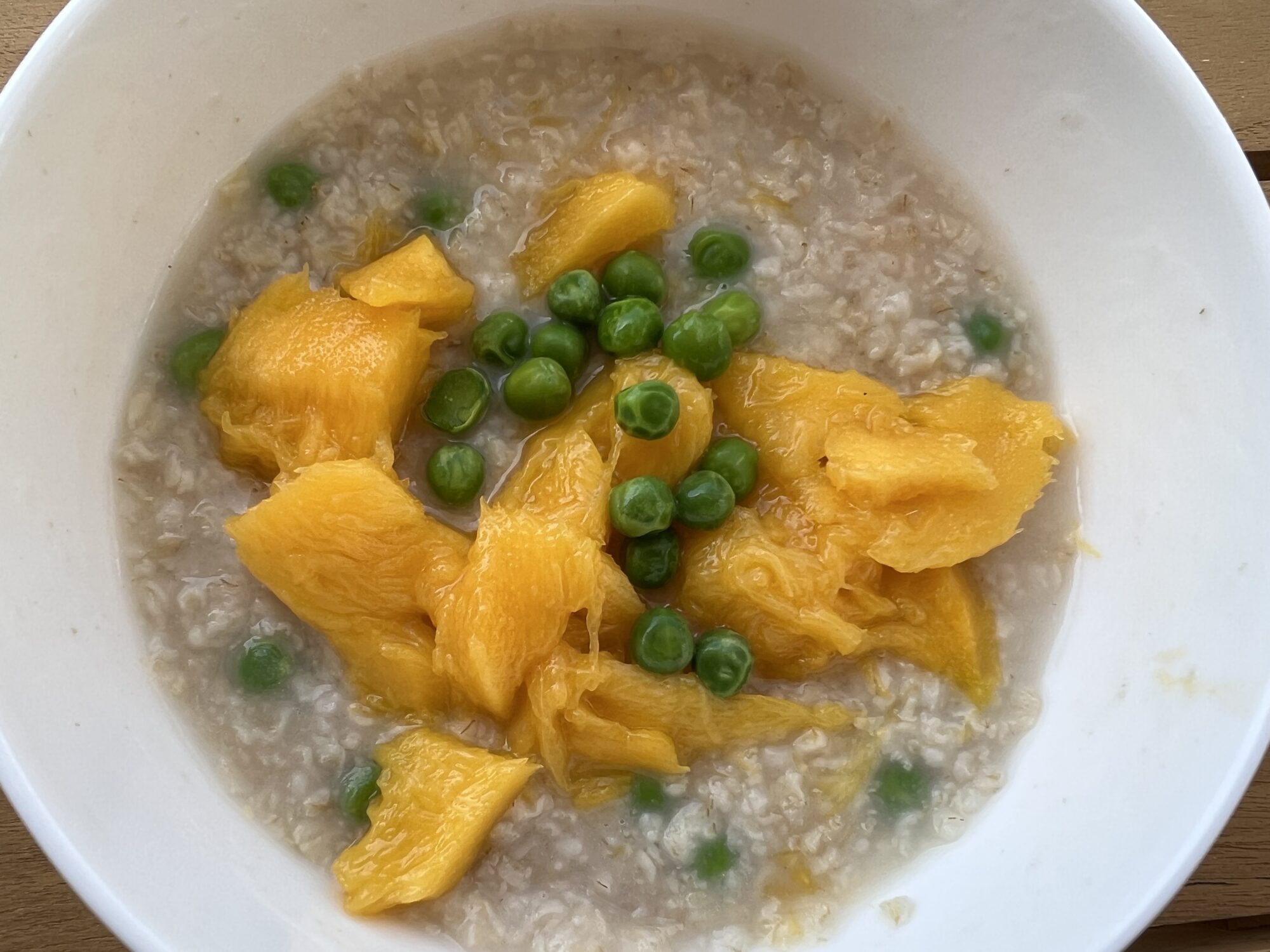 oatmeal with mango and peas